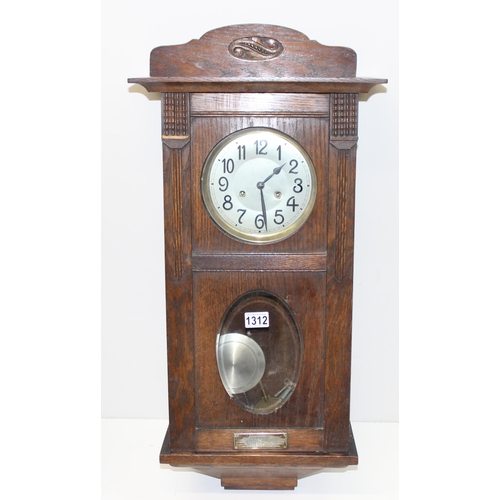 1312 - A large early 20th century grandfather clock with oak dome topped case, silvered dial and mechanical... 