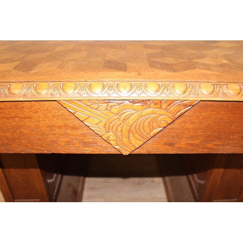 10 - An Art Deco period Belgian Library table with interesting parquetry inlaid top, marked 