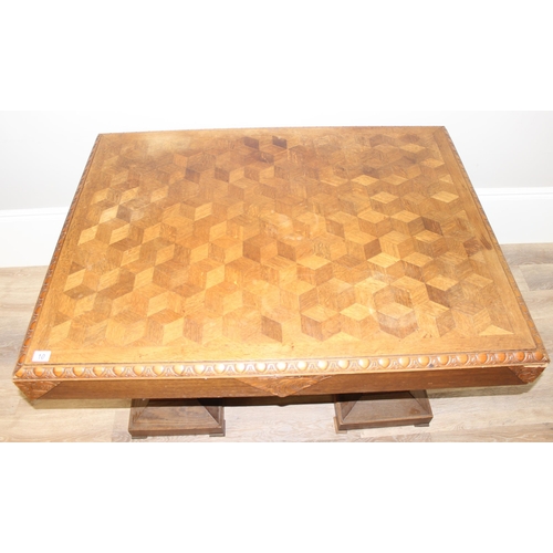 10 - An Art Deco period Belgian Library table with interesting parquetry inlaid top, marked 