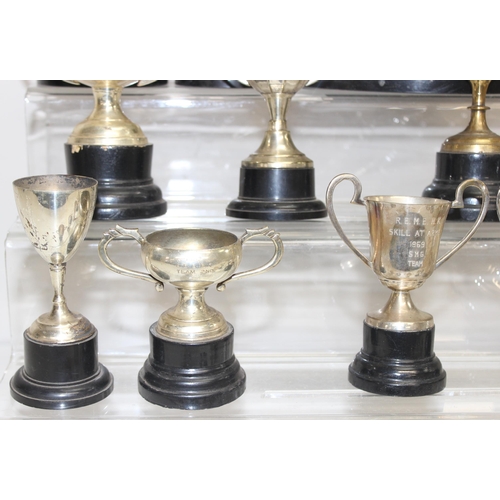 1053 - Qty of vintage silver-plated trophies on stands, approx 5.4kg gross