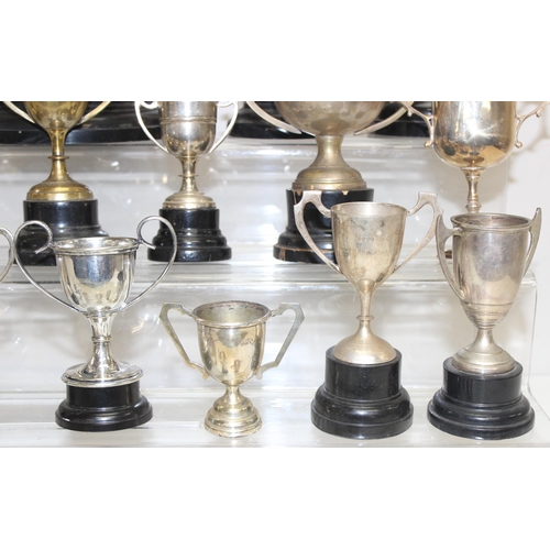 1053 - Qty of vintage silver-plated trophies on stands, approx 5.4kg gross