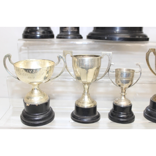 1053 - Qty of vintage silver-plated trophies on stands, approx 5.4kg gross