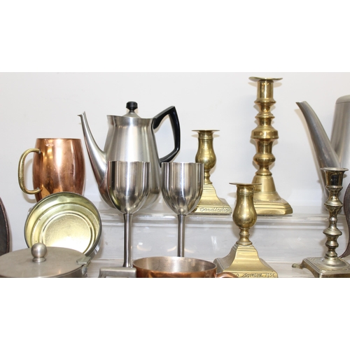 1767 - Mixed lot of antique and later metalware to incl candlesticks, teapots, copper charger, iron, shoe l... 