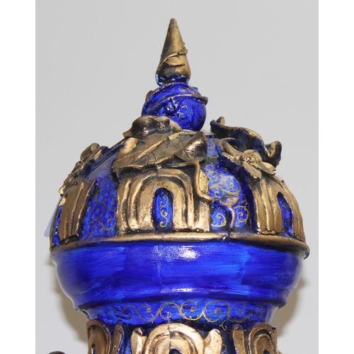 1784 - A pair of gold and blue relief decorated Regency style urn displays, each approx 70cm tall