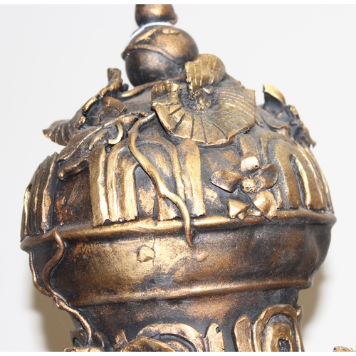 1785 - A pair of gold relief decorated Regency style urn displays, each approx 70cm tall