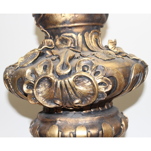 1785 - A pair of gold relief decorated Regency style urn displays, each approx 70cm tall