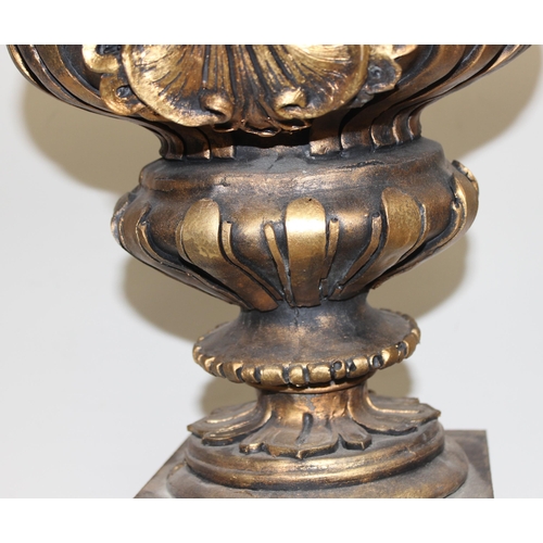 1785 - A pair of gold relief decorated Regency style urn displays, each approx 70cm tall