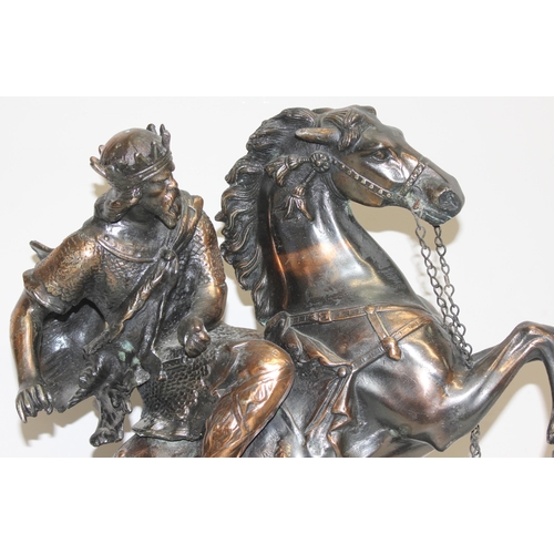 1788 - A large bronzed metal figure of a horse and warrior, approx 45cm tall