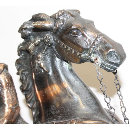 1788 - A large bronzed metal figure of a horse and warrior, approx 45cm tall