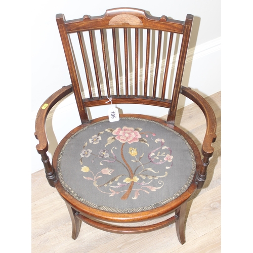 119 - An antique mahogany chair with inlaid details, stick back and embroidered seat, approx 75cm tall