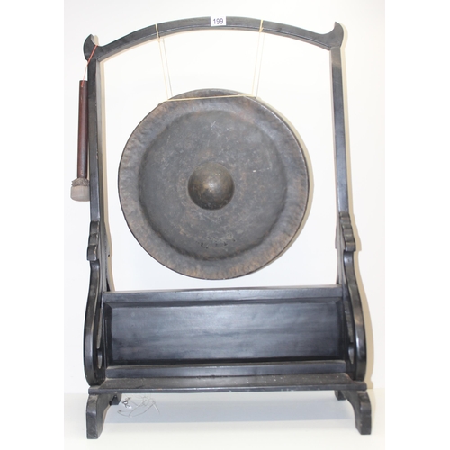 123 - A large vintage floor standing gong with wooden stand, approx 103cm tall x 65cm wide