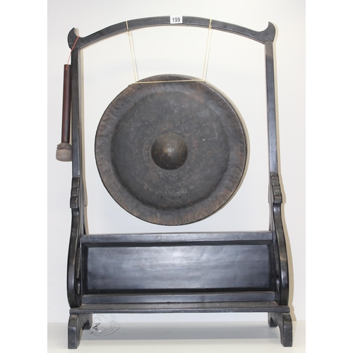 123 - A large vintage floor standing gong with wooden stand, approx 103cm tall x 65cm wide