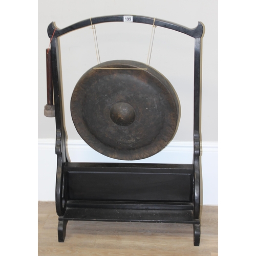 123 - A large vintage floor standing gong with wooden stand, approx 103cm tall x 65cm wide