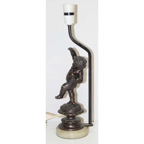 273 - A vintage bronzed metal cherub or putti lamp with marble base, approx 40cm tall