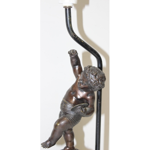 273 - A vintage bronzed metal cherub or putti lamp with marble base, approx 40cm tall