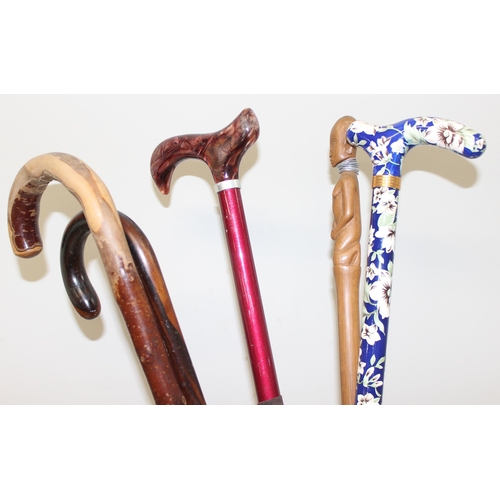 315 - Vintage spun fibreglass stick stand decorated with soldiers with some walking sticks to incl carved ... 