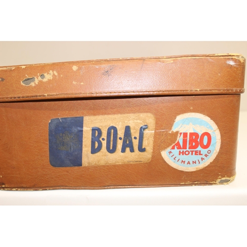 323 - 5 assorted vintage suitcases, 2 good quality leather examples and some with labels, the largest appr... 