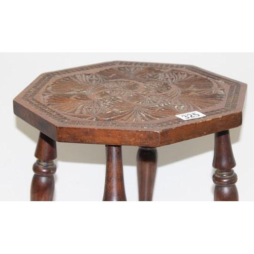 325 - An Arts & Crafts period octagonal topped side table with chip carved details, approx 35cm wide x 38c... 