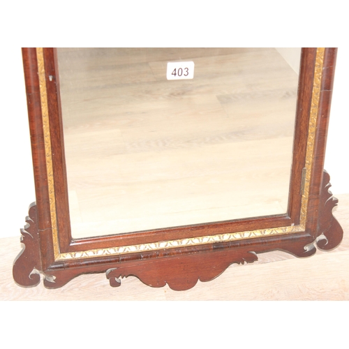 403 - A Georgian mahogany fretwork frame mirror with gilt details, approx 92cm x 55cm