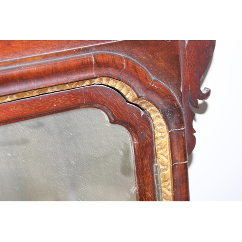 403 - A Georgian mahogany fretwork frame mirror with gilt details, approx 92cm x 55cm