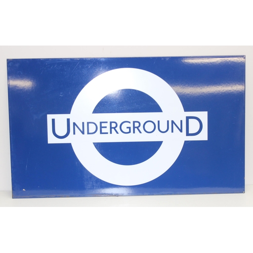 405A - An original London Underground enamel sign bearing the London Underground roundel in white with blue... 