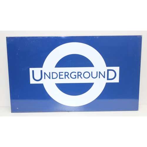 405A - An original London Underground enamel sign bearing the London Underground roundel in white with blue... 