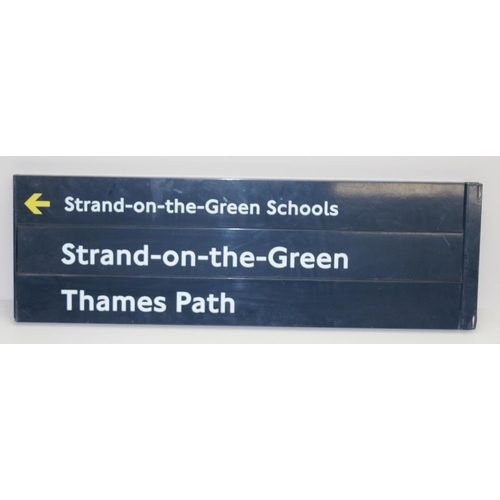 405E - An original London Underground or Transport for London metal finger post sign for Strand on the Gree... 