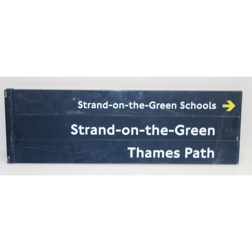 405E - An original London Underground or Transport for London metal finger post sign for Strand on the Gree... 