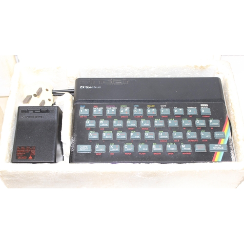 613 - Sinclair ZX Spectrum in box, Timex Printer 2040 & a collection of ZX Spectrum games