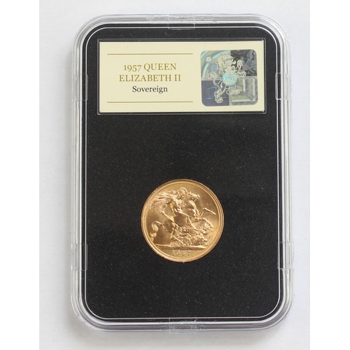 1230 - Gold Coins - 1957 Queen Elizabeth II  full gold sovereign coin, high grade, in wooden presentation b... 