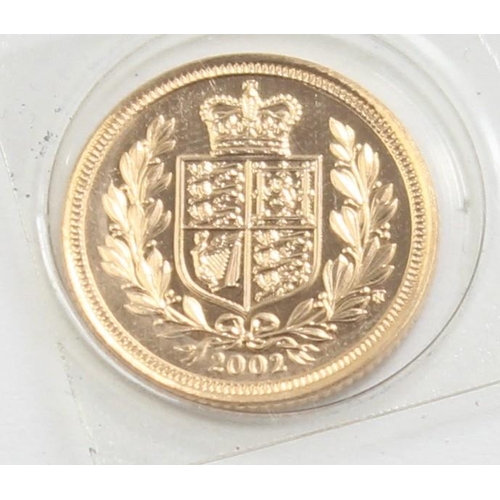 1251 - Gold Coins - Half Sovereign - 2002 Queen Elizabeth II Golden Jubilee uncirculated coin, with blue bo... 