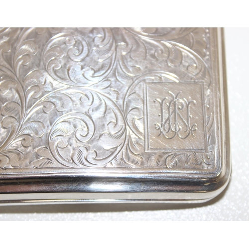 1087 - Heavily embossed silver cigarette case, hallmarks for Birmingham 1928 by John Henry Wynn, approx 112... 