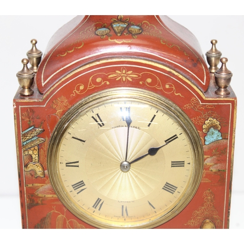 1316 - An early 20th century red lacquer cased Mappin & Webb Chinoiserie mechanical mantel clock with brass... 