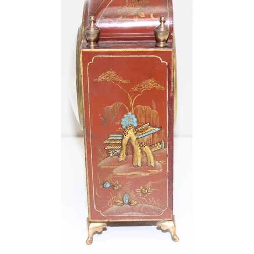 1316 - An early 20th century red lacquer cased Mappin & Webb Chinoiserie mechanical mantel clock with brass... 