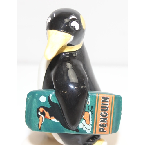 1637 - Advertising Figures - a Royal Doulton limited edition figure of Pick Up A Penguin, edition number 69... 