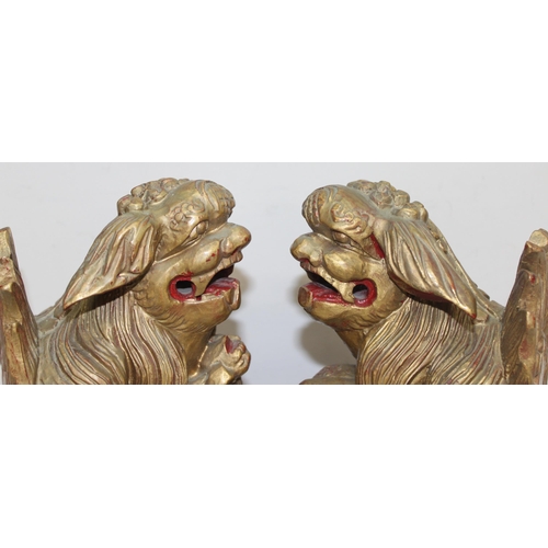 1677 - Pair of vintage Chinoiserie Temple Lions in red and gold, approx 26cm