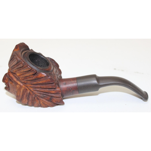 1686 - 3 vintage carved smoking pipes, one in case and a piece of carved bone in the form of a dragon (4)