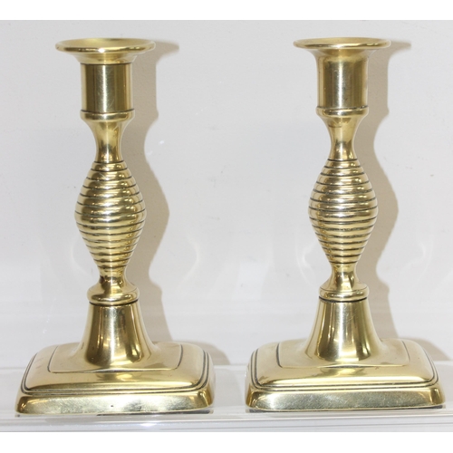 1798 - Pair of Georgian 'beehive' brass candlesticks with ejectors, stamped J.T. & Co. for John Turner & Co... 