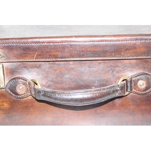 328 - Vintage hand-made and hand-riveted tan leather suitcase, approx 61 x 45 x 21cm