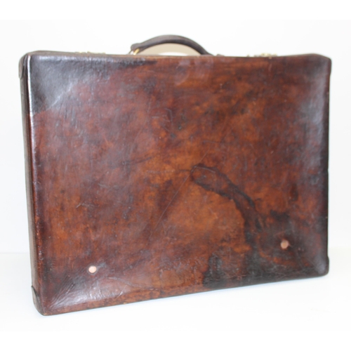 328 - Vintage hand-made and hand-riveted tan leather suitcase, approx 61 x 45 x 21cm