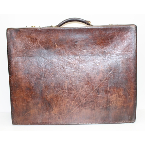 328 - Vintage hand-made and hand-riveted tan leather suitcase, approx 61 x 45 x 21cm