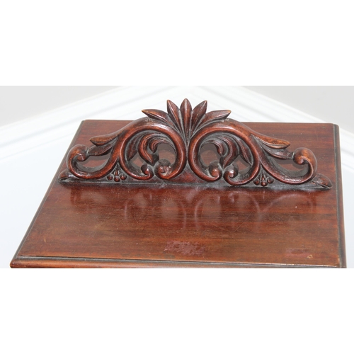 330 - An antique style table top mahogany bookcase with decorative carved top, approx 32cm square x 65cm t... 