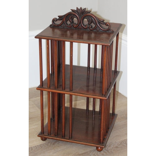 330 - An antique style table top mahogany bookcase with decorative carved top, approx 32cm square x 65cm t... 