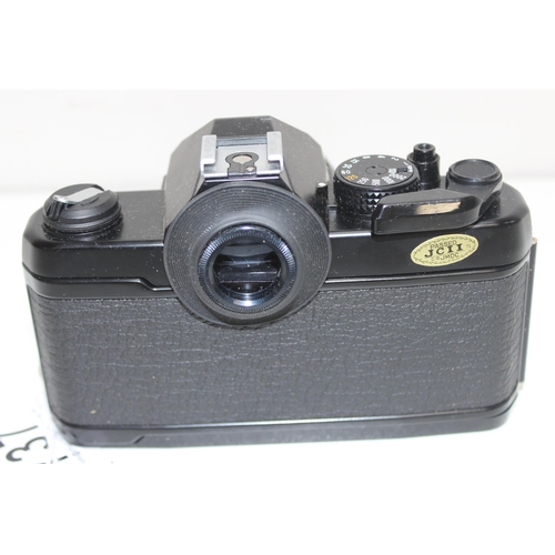 737 - A vintage Yashica FX-3 Super 2000 camera with Zeiss Planar 1.7/50 Lens