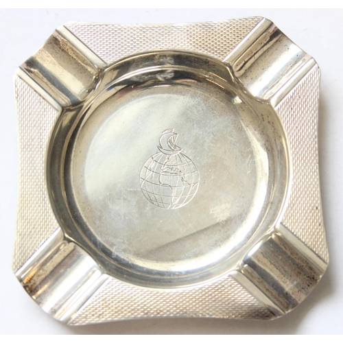 1035 - An Art Deco style silver ashtray, Birmingham 1973, an Islamic 900 silver dish and a small silver mou... 