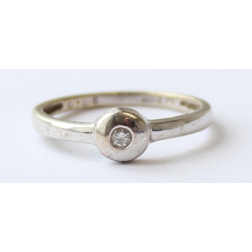 1102 - A retro style 18ct white gold and diamond set ring, marked 750 and XRF confirmed, approx size O, app... 