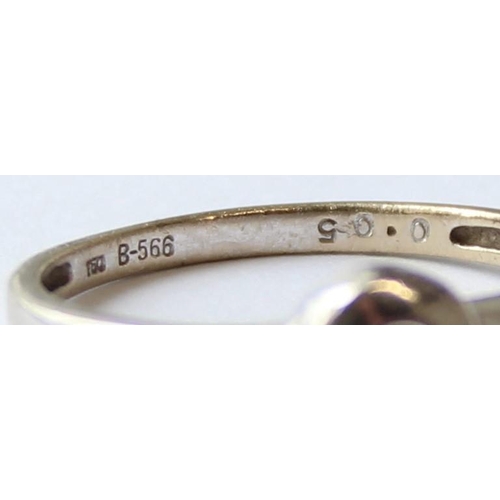 1102 - A retro style 18ct white gold and diamond set ring, marked 750 and XRF confirmed, approx size O, app... 