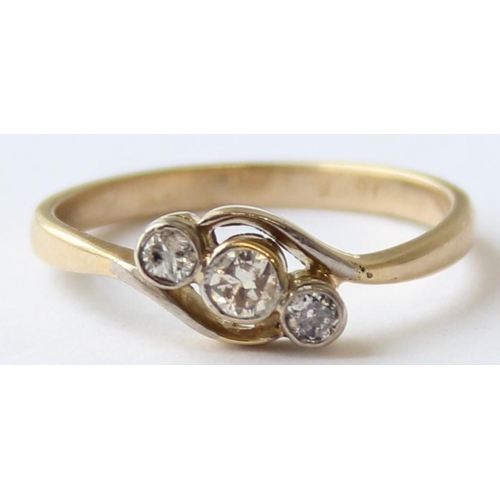 1103 - A vintage 18ct gold diamond trilogy ring with crossover setting, marked 18ct and XRF confirmed, the ... 