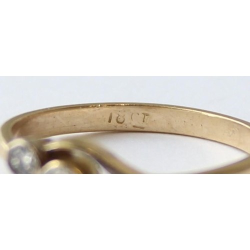 1103 - A vintage 18ct gold diamond trilogy ring with crossover setting, marked 18ct and XRF confirmed, the ... 