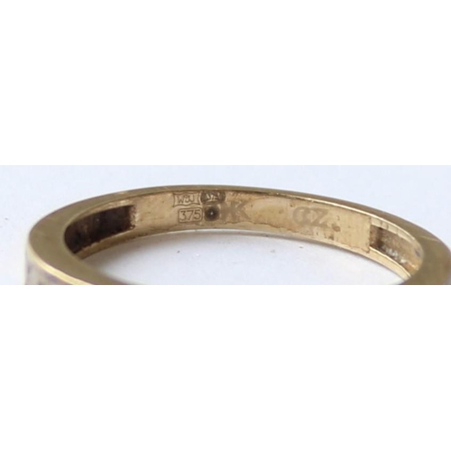 1108 - A 9ct gold and white stone half eternity ring, marked and XRF confirmed, approx size J, approx 1.38g... 